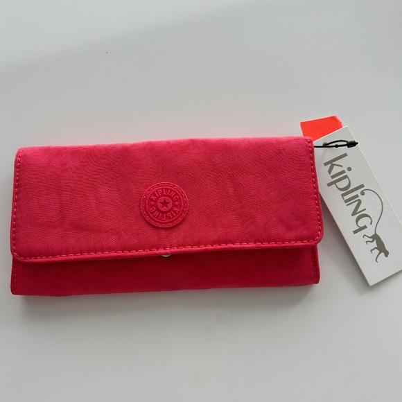 Kipling Handbags - Kipling pink wallet brand new with tags
